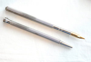 A Dip Pen and Pencil set.