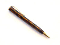 Vintage propelling pencil in marbled brown.