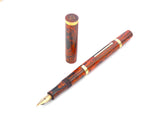 Mabie Todd Swan SF130 in Red Mottled Hard Rubber